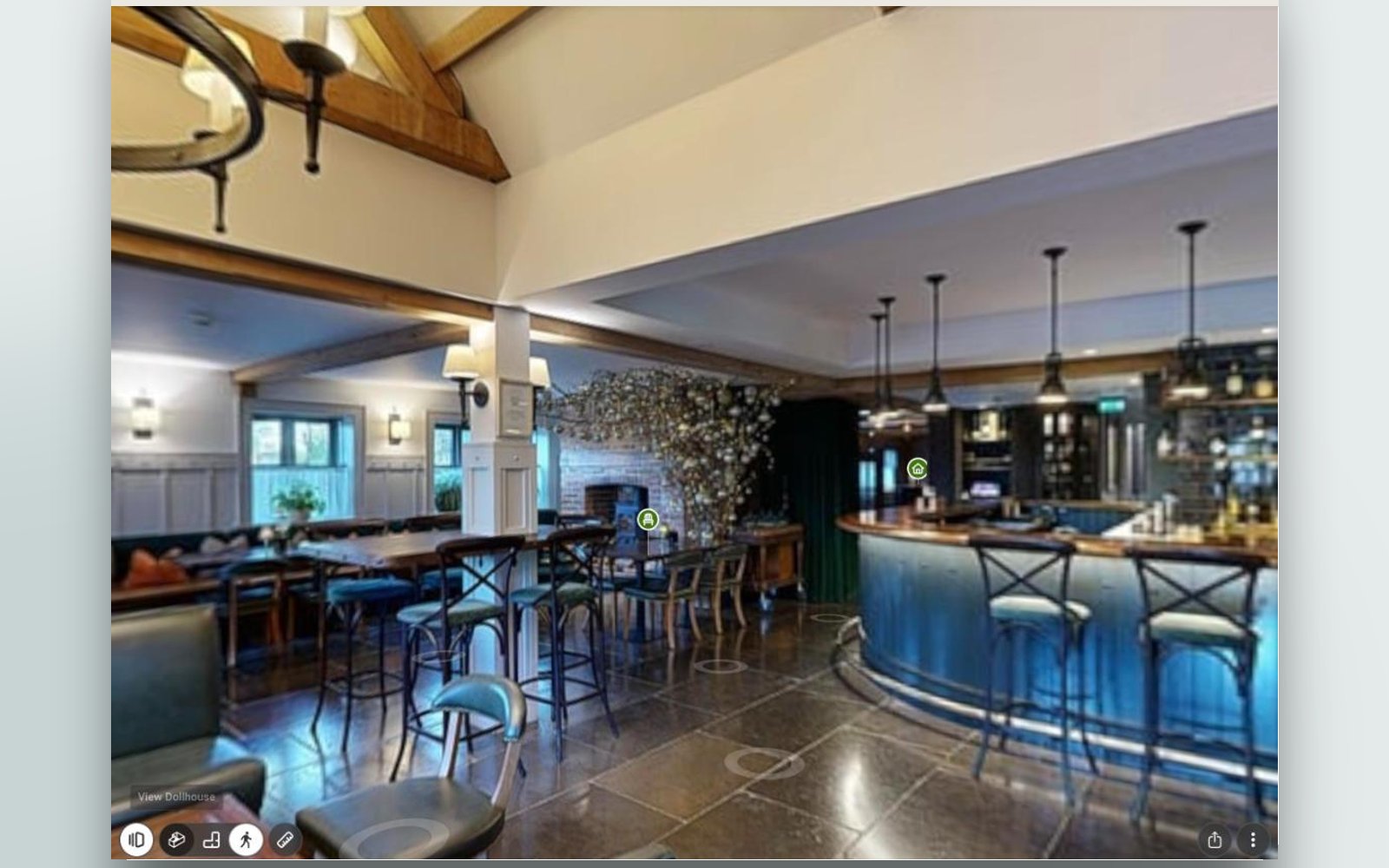 The bar at Hurley House in the Matterport tour, with the highlight reel along the bottom