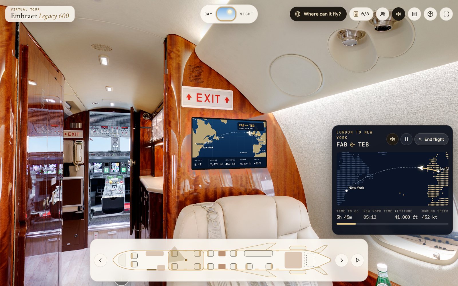 Cabin bulkhead screen with a moving map and the flight panel counting down time to go